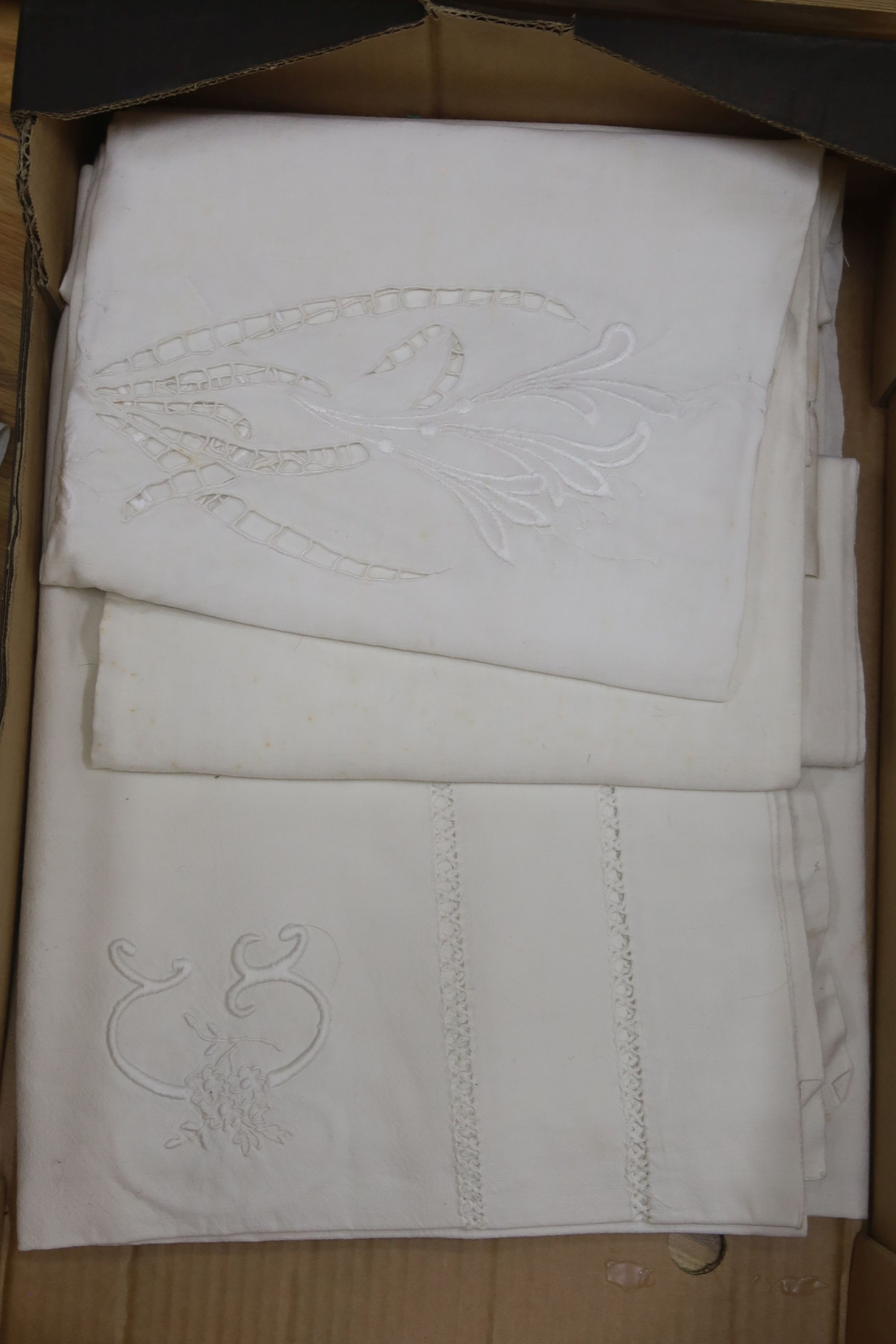 Six French provincial embroidered and cutworked sheets